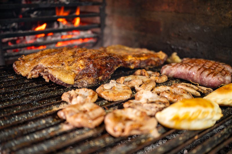 4 rivers smokehouse BBQ preparation — slow-smoked meats and fresh ingredients